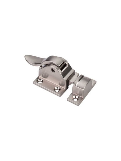 Cabinet Lift Latch with Curved Handle in Satin Nickel.